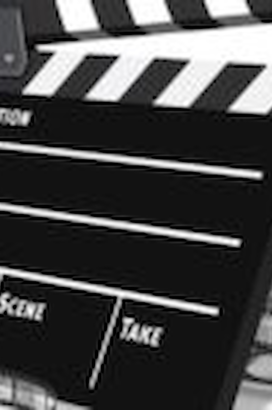 Billede af en filmrulle og filmklapper